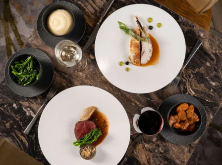 Exquisite dinner for two with gourmet dishes and wine at a luxurious Hastings Hotel.