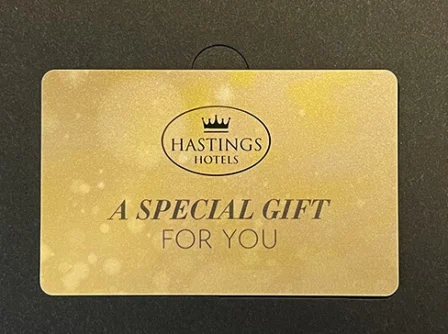 Hastings Hotels gift card with gold design.